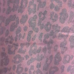 Light pink washed leopard print skinny jeans